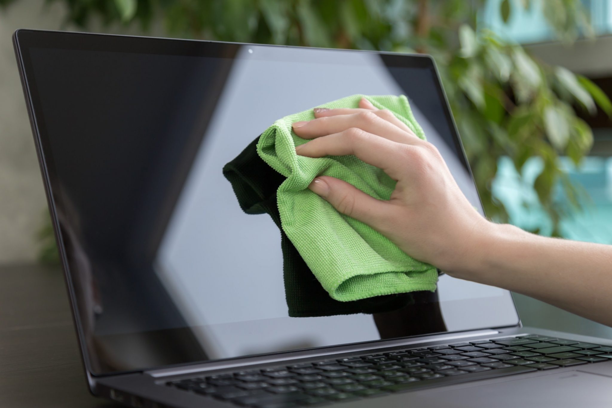 How To Safely Clean Your Computer Screen Computer A Services   Girl Wipes Dust From Laptop Screen Pc Home Hygiene Apartment Sanitary Staff Chores Cleanup Dust Girl T20 B8vpnx 2048x1365 